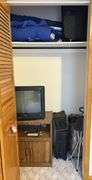 Cot, Luggage & RCA TV/Entertainment Center