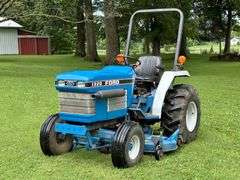 1987-1998 Ford 1320 Tractor with Mid-Mount Ford 914 Mower