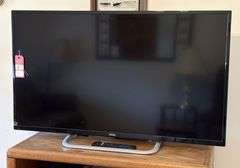 Haier Flatscreen TV & Entertainment Center