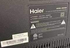 Haier Flatscreen TV & Entertainment Center