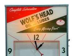 Wolf's Head Oil and Lubes Lighted Clock