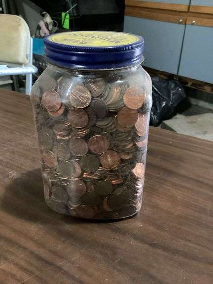 7" tall jar full of Lincoln cents image