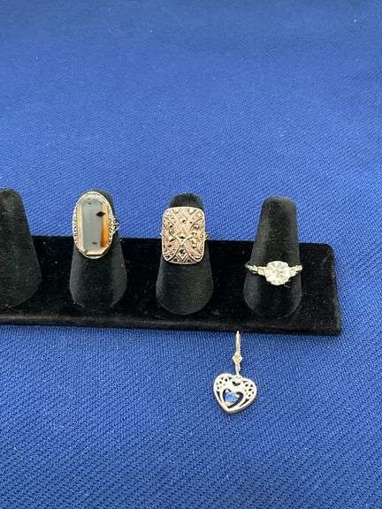 Two size 4 sterling rings, sterling heart pendant, sterling ring, size 8 3/4 image