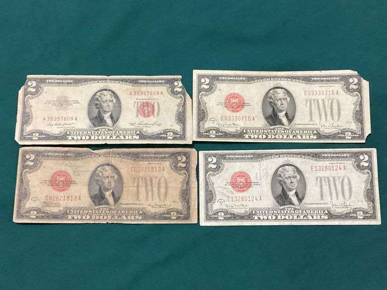 Four well circulated $2 Legal Tender notes, red seals image