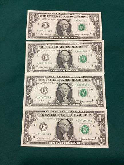 Four consecutive 1969-A $1 Federal Reserve notes, Gem Unc image