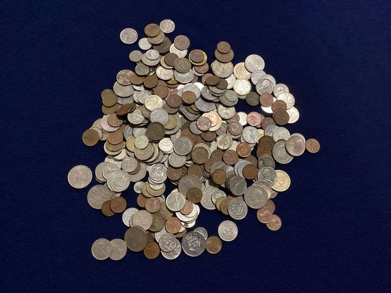 Bag of foreign coins, with some silver coins image