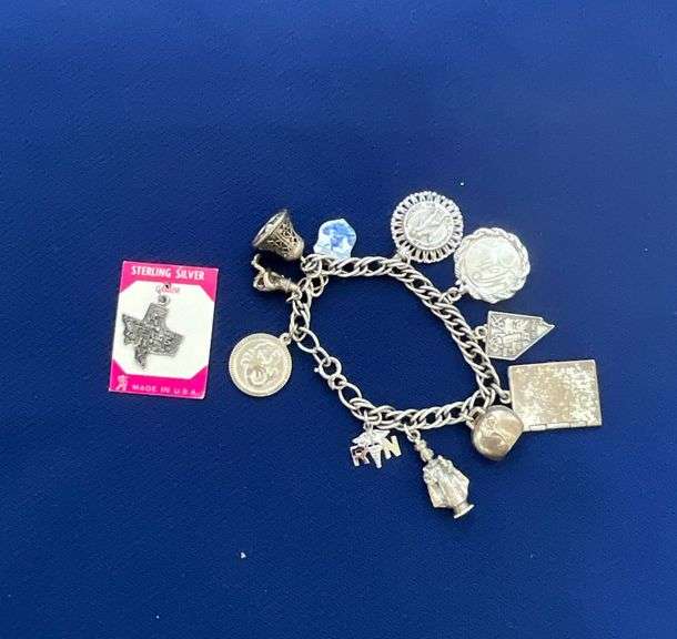 Sterling charm bracelet, most charms are also marked sterling image