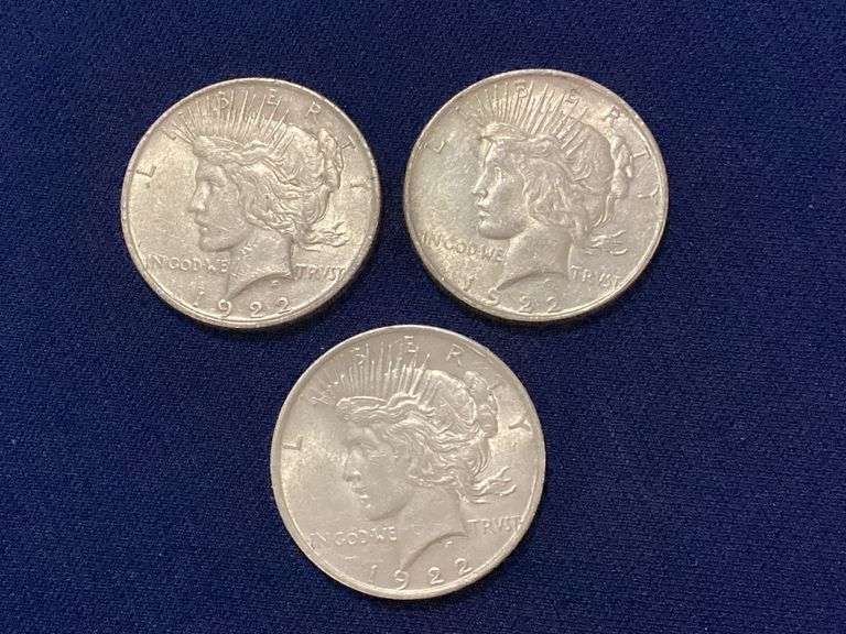 Three 1922 Peace dollars, all XF or better image
