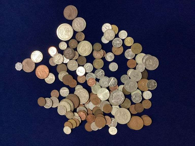 Bag of foreign coins with lots of Canadian silver coins image