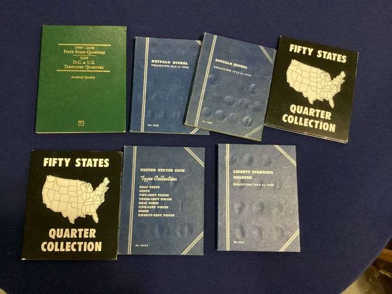 Seven assorted empty coin albums image