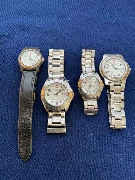 Four Swiss Army men's wristwatches image