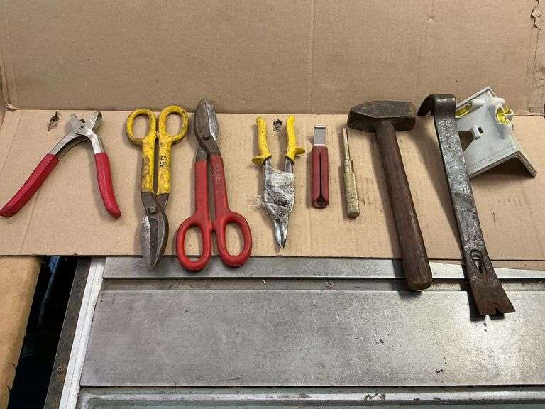Tin snips, hammer, pry bar, etc. image