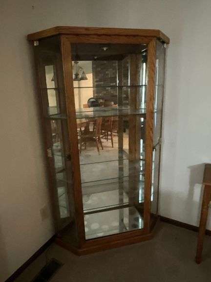 Lighted corner curio cabinet image