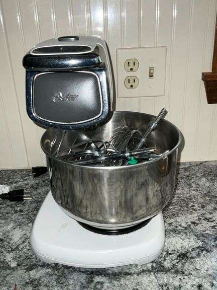 Oster stand mixer with stainless bowl and accessories image