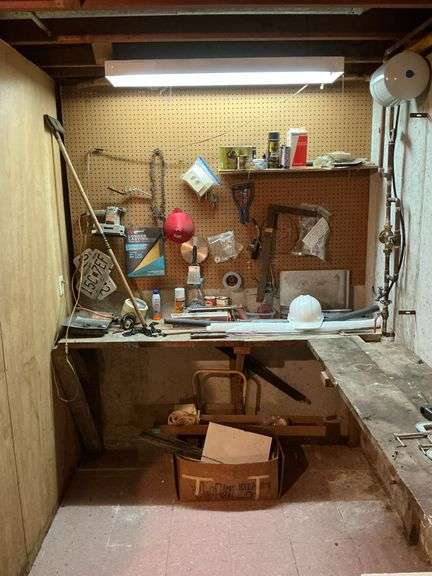 Contents of corner pegboard, 2 metal sawhorses image