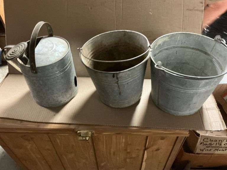 Pair of galvanized buckets image