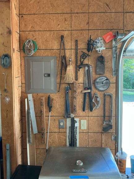 Pry bars, hack saw, vintage lamp holders, draw knife, pipe bender, etc. image