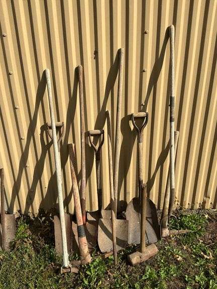 Long handled tools, shovels, hoe, pick, etc. image