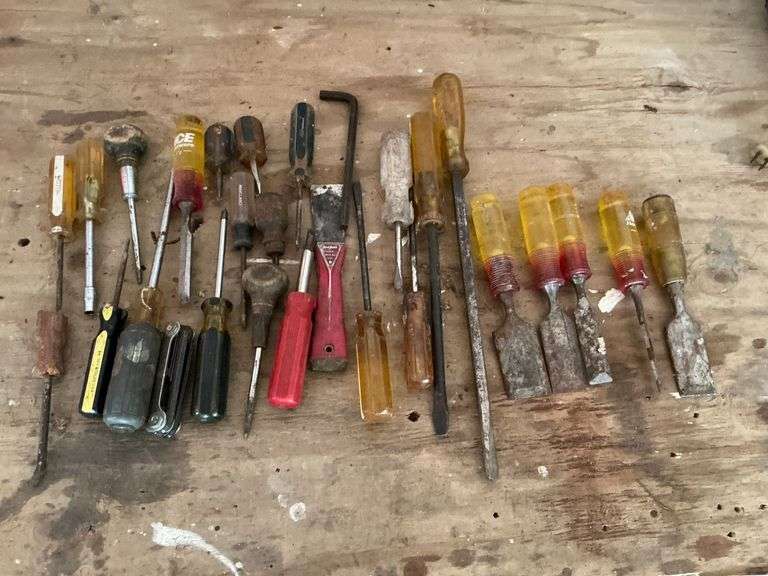 Assortment of screwdrivers & chisels. image