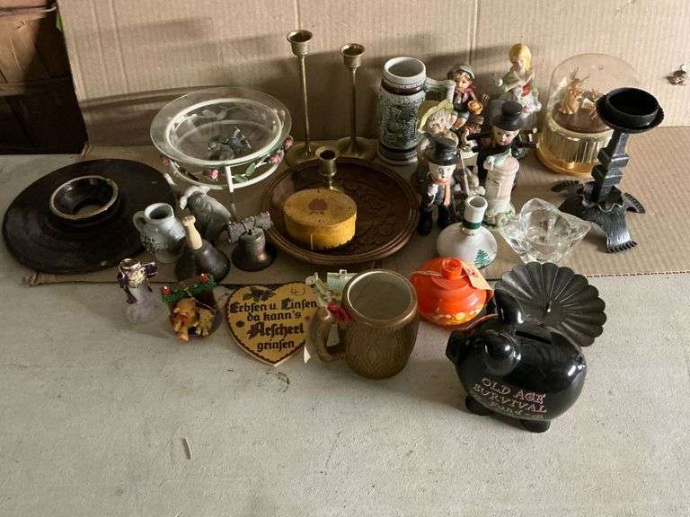 Decorative items, candle sticks, figurines, piggy bank, elephants, etc. image