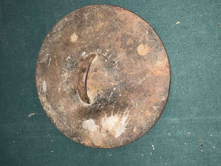 Wagner No. 8 cast iron lid, marked Drip Drop Baster image