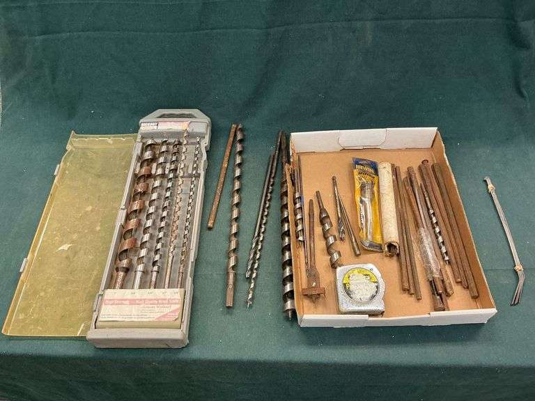 Wood and concrete bits, tape measure, etc. image