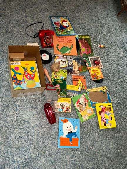 Children's puzzles, records, telephone, broken doll, flash cards, etc. image