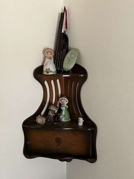 Corner shelf and contents image