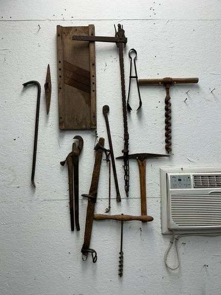 Vintage tools, fence stretcher, kraut cutter, pick axe, crow bar, etc. image