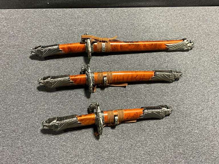 3 Chinese daggers in decorative sheaths image