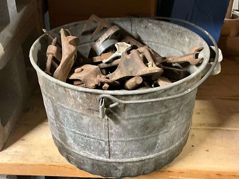 Rusty treasures, Monkey wrench, hand tools, galvanized bucket image