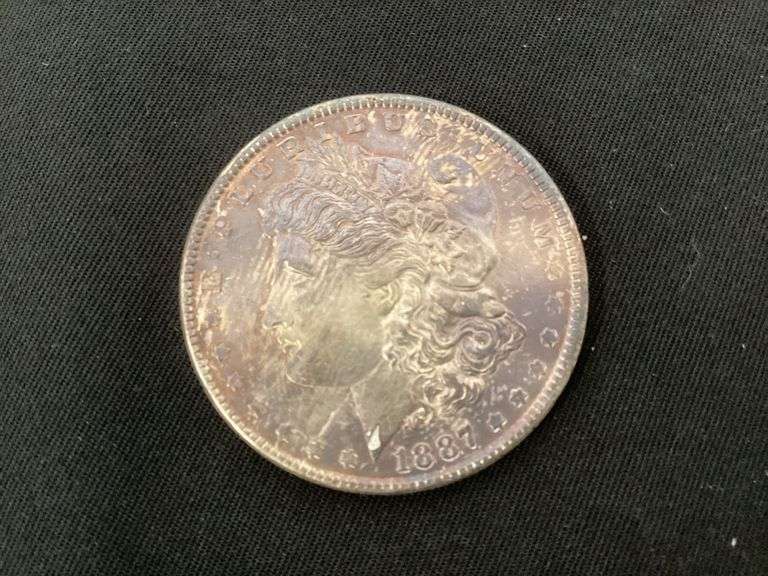 1887 Morgan silver dollar image