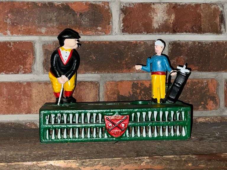 Cast iron golfing bank image