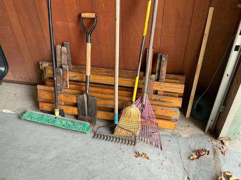 Broom, rake, shovel, sides for a trailer, etc. image