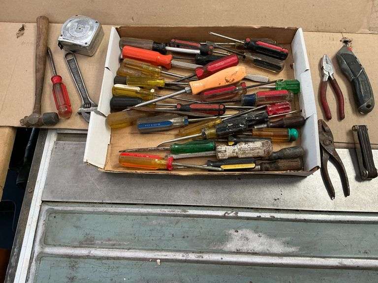Screwdrivers, tape measure, hammer, pliers, allen wrenches, etc. image