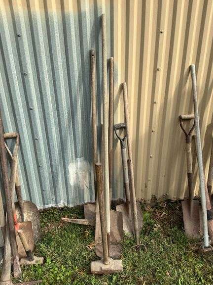 Long handled tools, sledge hammer, shovels, pick, etc. image
