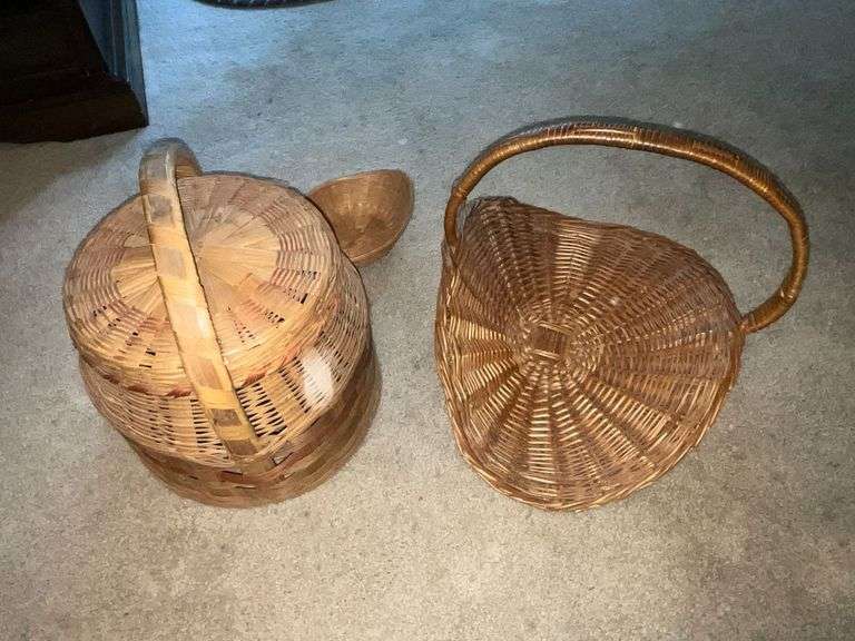 4 Woven baskets, pine cones. image