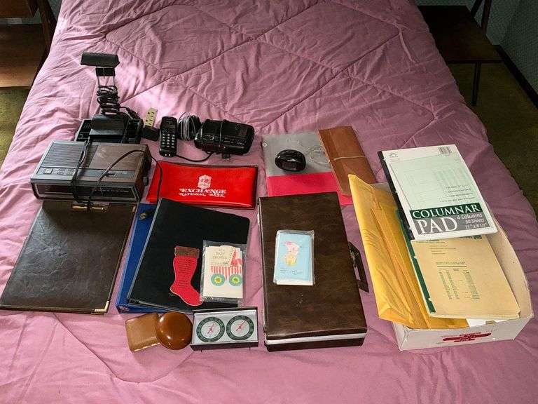 Office supplies, desk lamp, ledger paper, etc. image