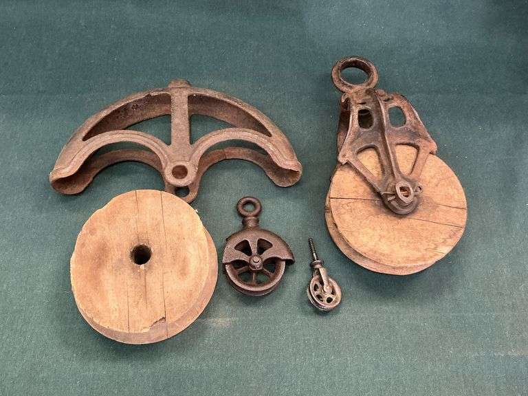 2 Wooden pulleys and pulley parts image