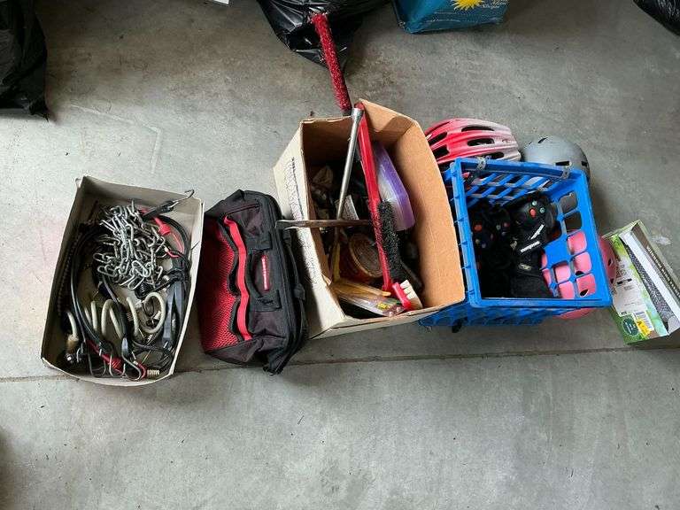 Bike helmets, window bird feeder, Craftsman tool bag, 4-way lug wrench, tools image