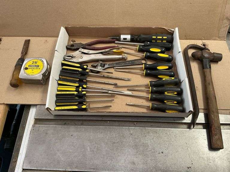Stanley screwdrivers, locking pliers, tape measure, hammer, etc. image
