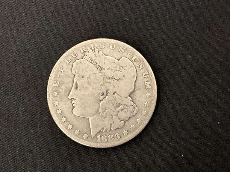 1883 Morgan silver dollar image