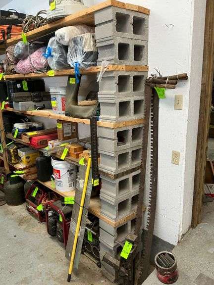 Wood and cinder block shelving, CONTENTS NOT INCLUDED image