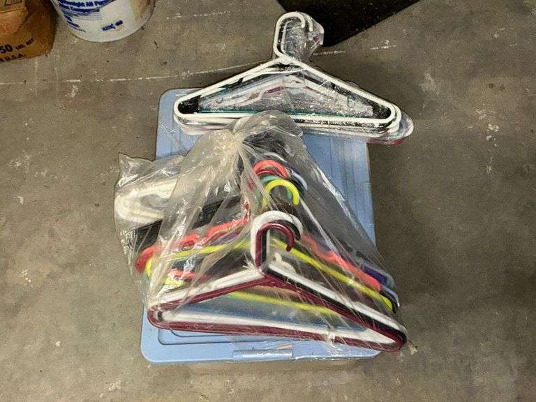 Assortment of plastic clothes hangers image