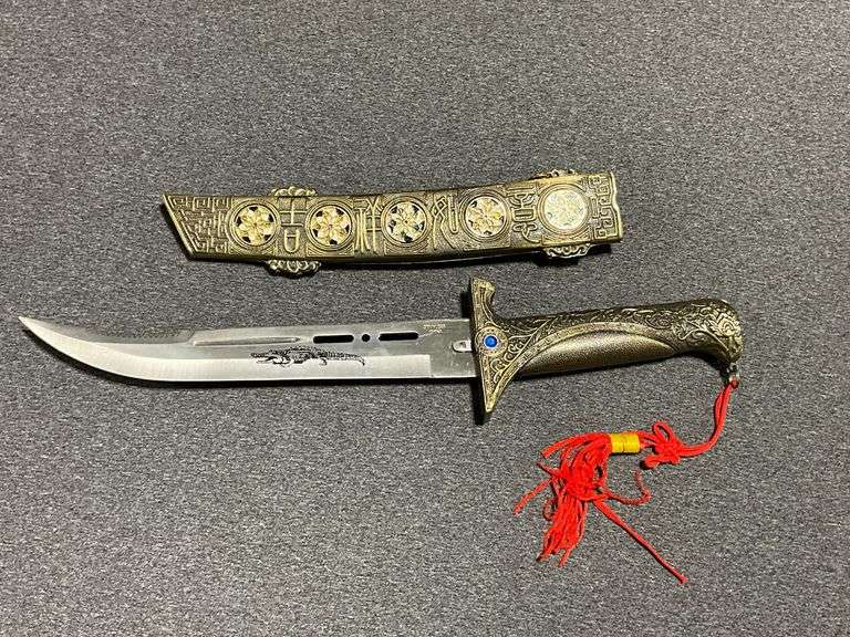 Oriental dagger in decorative sheath image