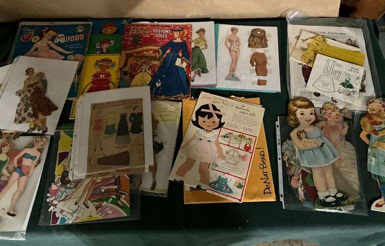 Paper and cardboard dolls, some vintage image