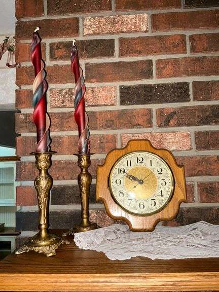 Pair of brass candlesticks image
