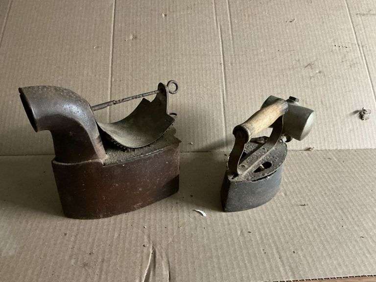 Pair of antique cast iron steam irons image