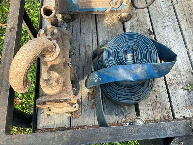 Meyers pump and 2 rubber hoses unknown length. image