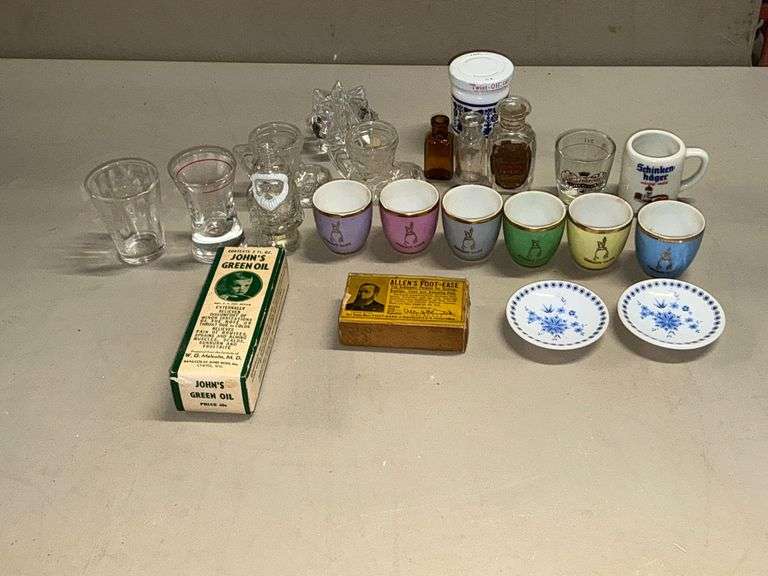 Assortment of shot glasses, saki cups image